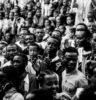 grayscale photo mass of people