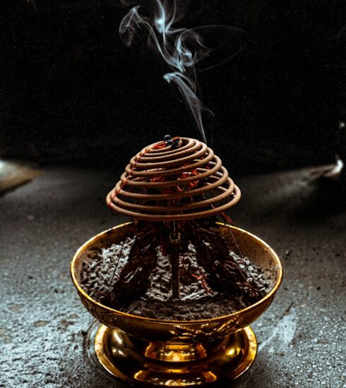 brass round container with fire